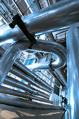 Image showing industrial ladders, cables, pipelines in blue tones