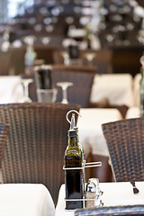 Image showing Olive oil bottle in restaurant