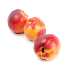 Image showing Three ripe nectarines