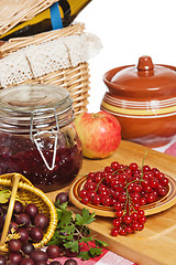 Image showing Jam with berries of red currant and gooseberry on the table