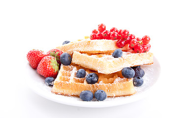 Image showing sweet fresh tasty waffles with mixed fruits isolated