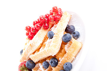 Image showing sweet fresh tasty waffles with mixed fruits isolated