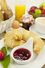 Image showing traditional french breakfast on table in morning