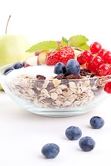 Image showing deliscious healthy breakfast with flakes and fruits isolated