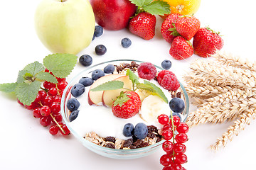 Image showing deliscious healthy breakfast with flakes and fruits isolated