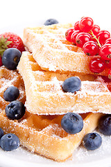 Image showing sweet fresh tasty waffles with mixed fruits isolated