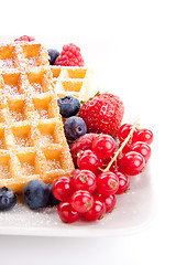 Image showing sweet fresh tasty waffles with mixed fruits isolated