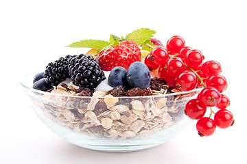 Image showing deliscious healthy breakfast with flakes and fruits isolated