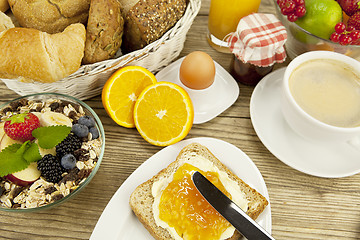 Image showing tasty breackfast with toast and marmelade on table