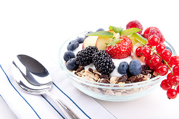 Image showing deliscious healthy breakfast with flakes and fruits isolated