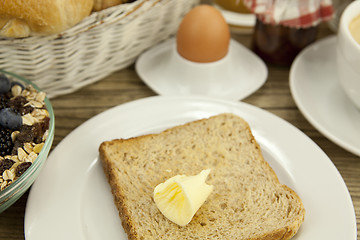 Image showing traditional french breakfast on table in morning