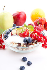 Image showing deliscious healthy breakfast with flakes and fruits isolated