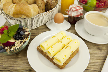 Image showing breakfast in morning with fruits and cheese toast and coffee