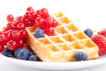 Image showing sweet fresh tasty waffles with mixed fruits isolated