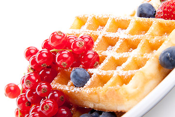 Image showing sweet fresh tasty waffles with mixed fruits isolated