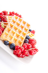 Image showing sweet fresh tasty waffles with mixed fruits isolated