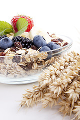 Image showing deliscious healthy breakfast with flakes and fruits isolated