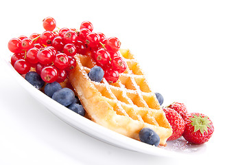 Image showing sweet fresh tasty waffles with mixed fruits isolated