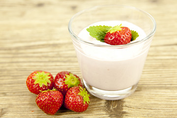 Image showing fresh tasty strawberry yoghurt shake dessert on table