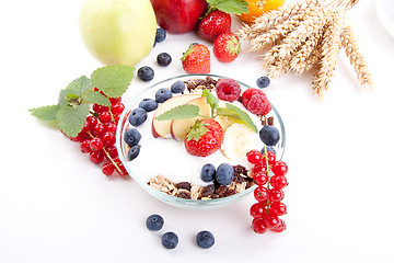 Image showing deliscious healthy breakfast with flakes and fruits isolated