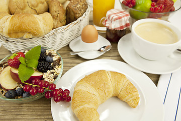Image showing traditional french breakfast on table in morning