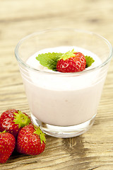 Image showing fresh tasty strawberry yoghurt shake dessert on table