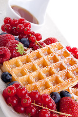 Image showing sweet fresh tasty waffles with mixed fruits isolated