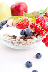 Image showing deliscious healthy breakfast with flakes and fruits isolated