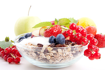 Image showing deliscious healthy breakfast with flakes and fruits isolated