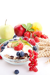 Image showing deliscious healthy breakfast with flakes and fruits isolated