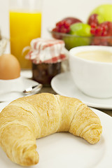 Image showing traditional french breakfast on table in morning