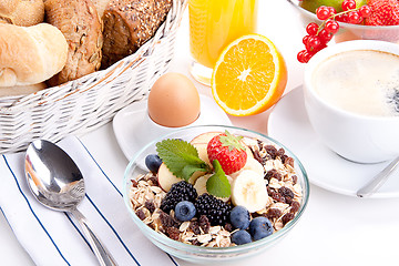 Image showing deliscious healthy breakfast with flakes and fruits isolated