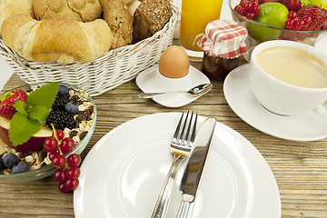 Image showing traditional french breakfast on table in morning