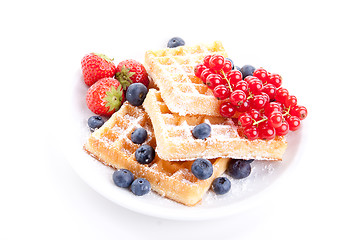 Image showing sweet fresh tasty waffles with mixed fruits isolated