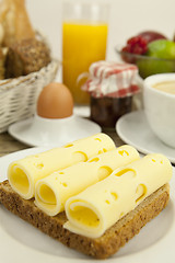 Image showing breakfast in morning with fruits and cheese toast and coffee