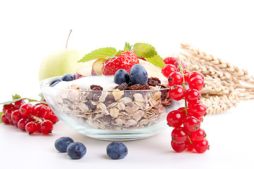 Image showing deliscious healthy breakfast with flakes and fruits isolated