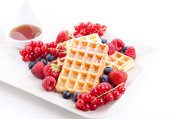 Image showing sweet fresh tasty waffles with mixed fruits isolated