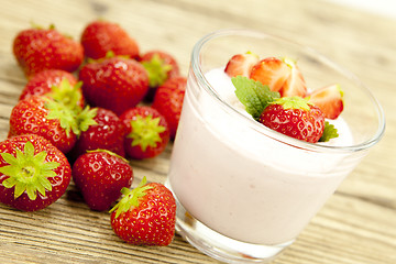 Image showing fresh tasty strawberry yoghurt shake dessert on table