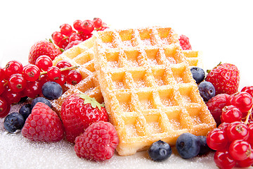 Image showing sweet fresh tasty waffles with mixed fruits isolated