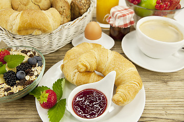 Image showing traditional french breakfast on table in morning