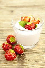 Image showing fresh tasty strawberry yoghurt shake dessert on table