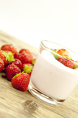 Image showing fresh tasty strawberry yoghurt shake dessert on table