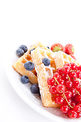 Image showing sweet fresh tasty waffles with mixed fruits isolated