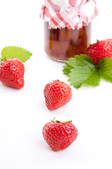 Image showing deliscious strawberry jam with fresh fruits isolated