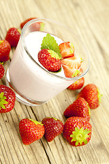 Image showing fresh tasty strawberry yoghurt shake dessert on table