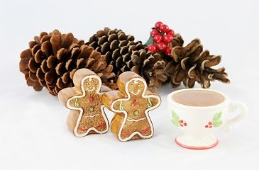 Image showing Gingerbread men and pinecones for xmas