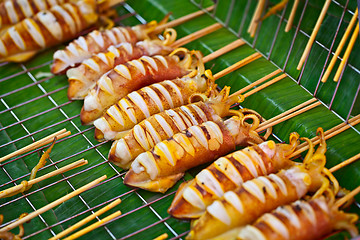 Image showing Grilled squids on market