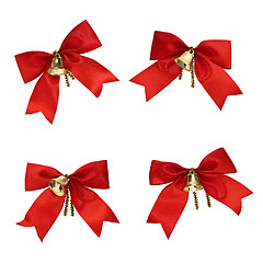 Image showing Christmas decorations - red ribbons and bells