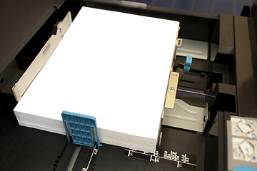 Image showing details of inserts a paper A4 into a laser copier