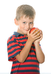 Image showing Boy holding an apple